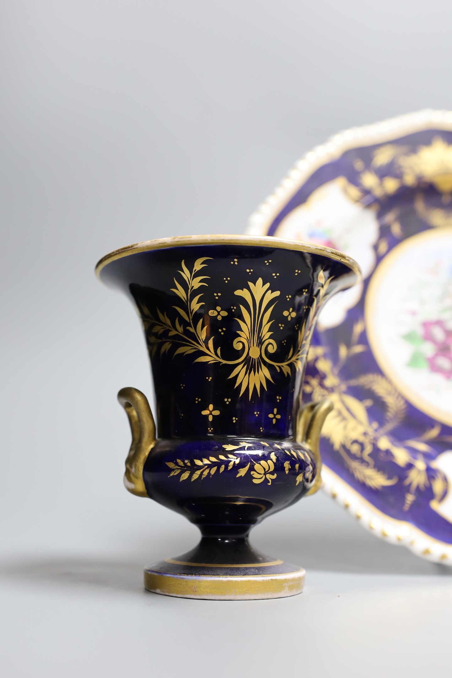 A Coalport plate and three other pieces, Plate 26 cms diameter